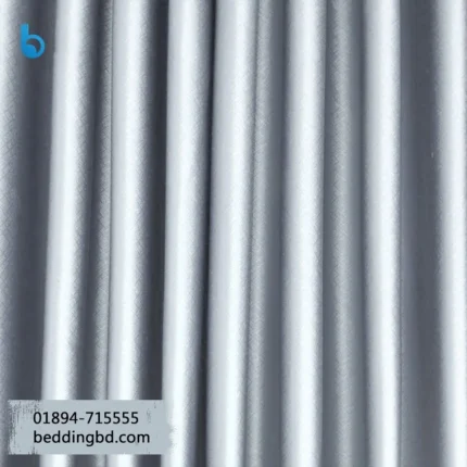Blackout Curtain - Silver Silver color blackout curtain hanging in a modern room setting.
