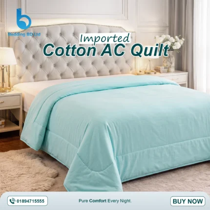 Imported cotton AC quilt Lightweight draped on a modern bed.